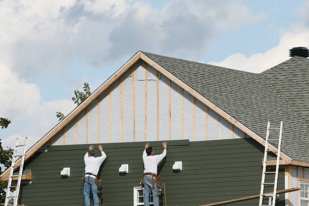 Professional Vinyl Siding technician working in Barton, OH